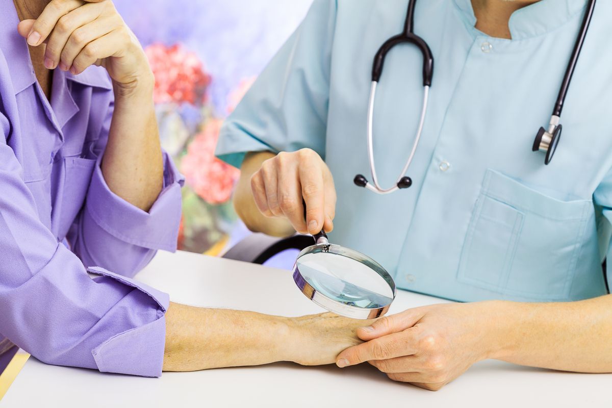 Doctor examining patient.