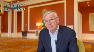 Harry Travis sitting for a video interview