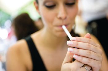 woman smoking cigarette