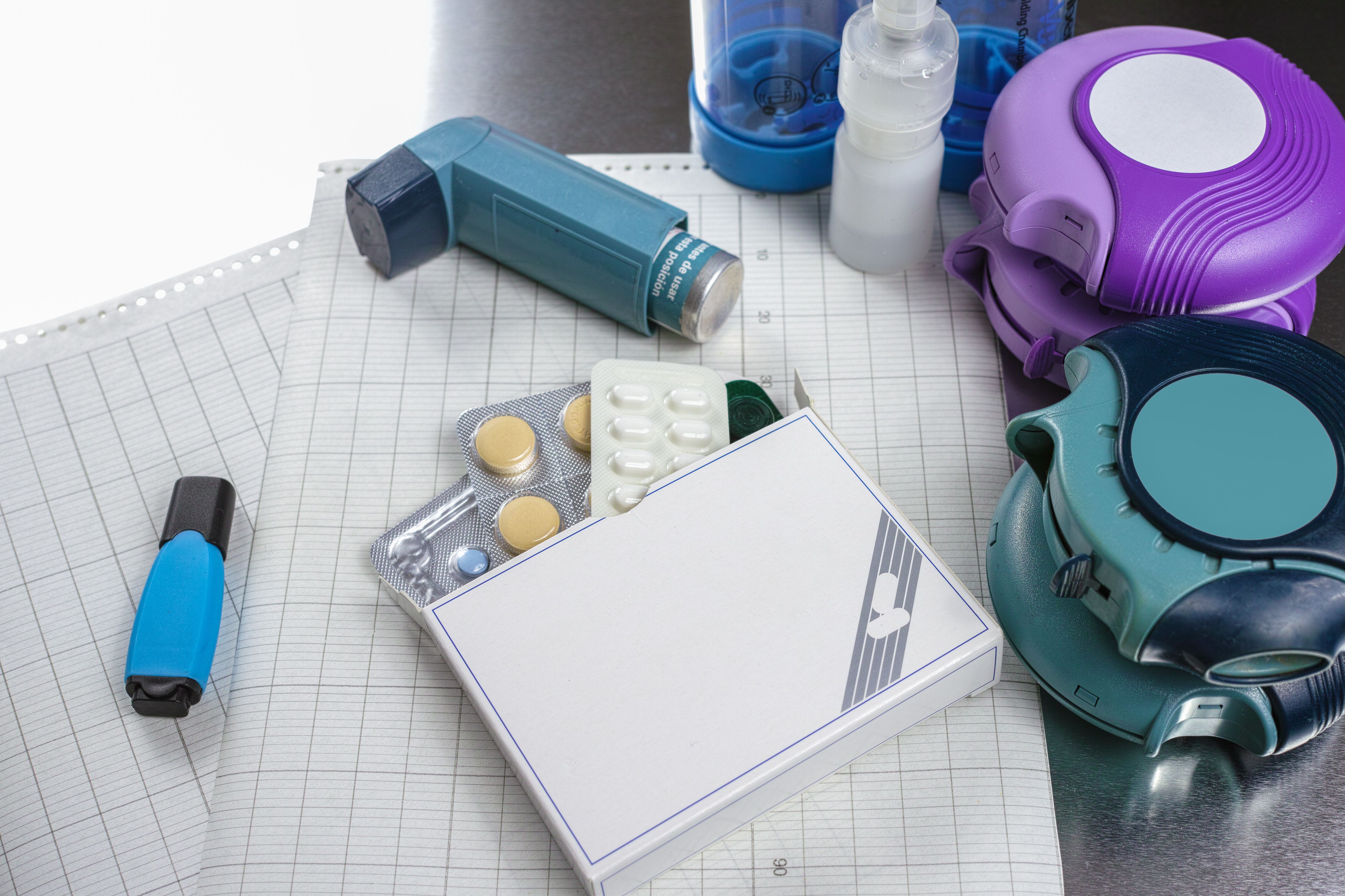 Asthma, allergy, illness relief concept, salbutamol inhalers and drugs - barmilini - stock.adobe.com