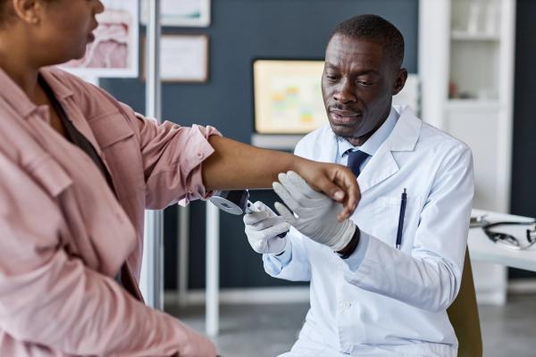 skin cancer screening doctor | Image Credit: © Seventyfour - stock.adobe.com