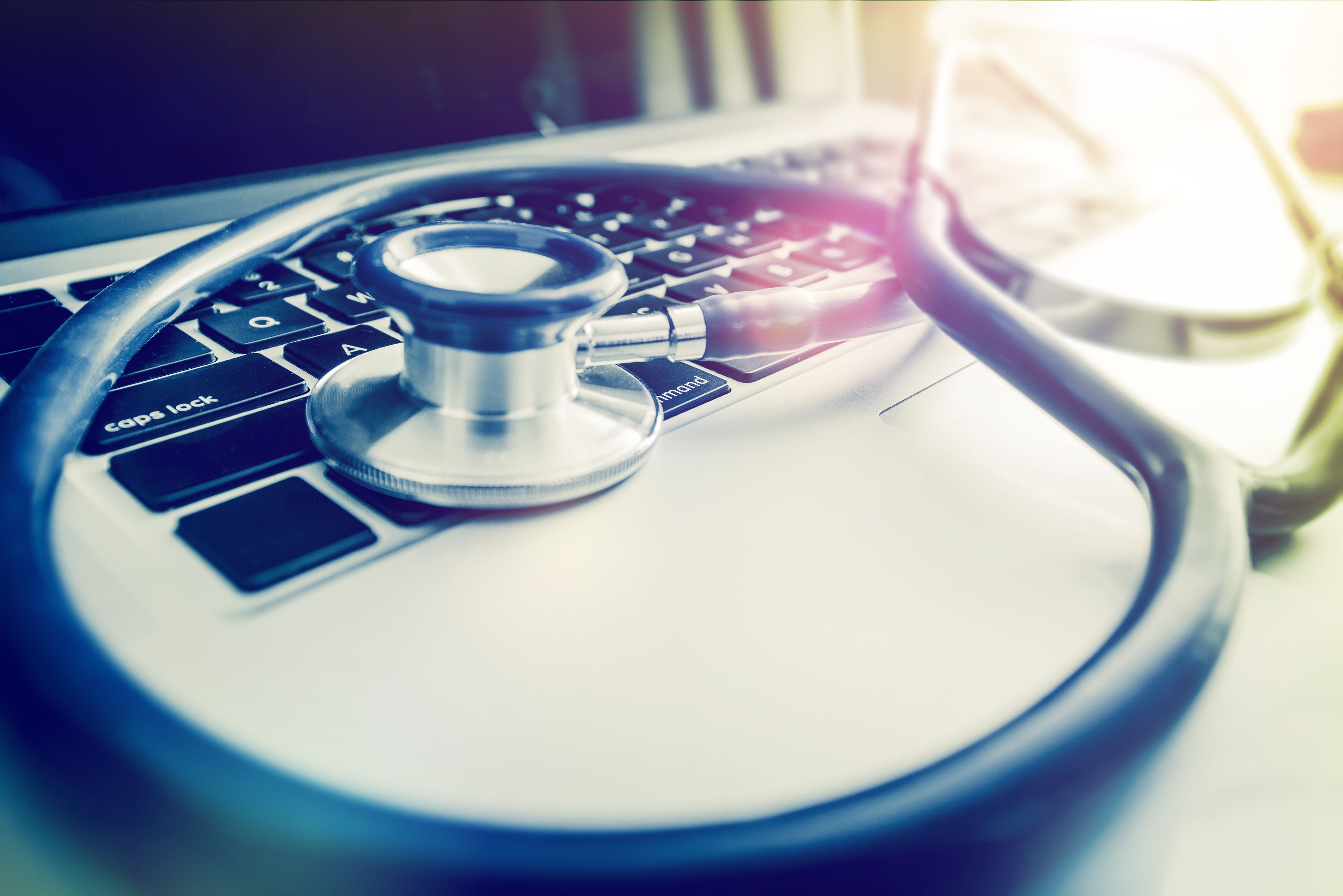 stethoscope on a laptop