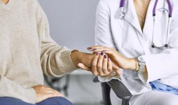 Doctor comforting a patient | Image credit: lenetsnikolai - stock.adobe.com