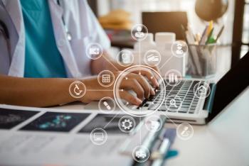 Doctor working on laptop - NINENII - stock.adobe.com.jpeg