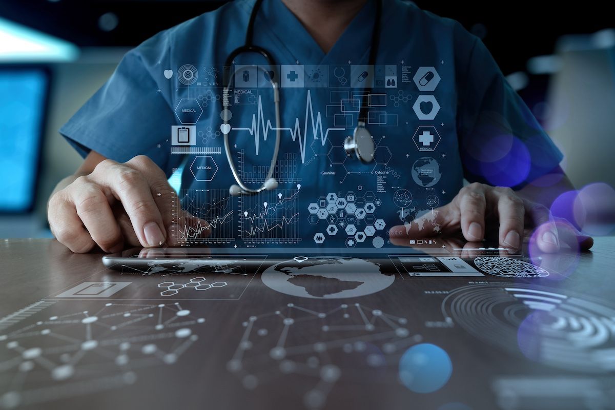 Medical data floating above a device | Image credit: everythingpossible - stock.adobe.com