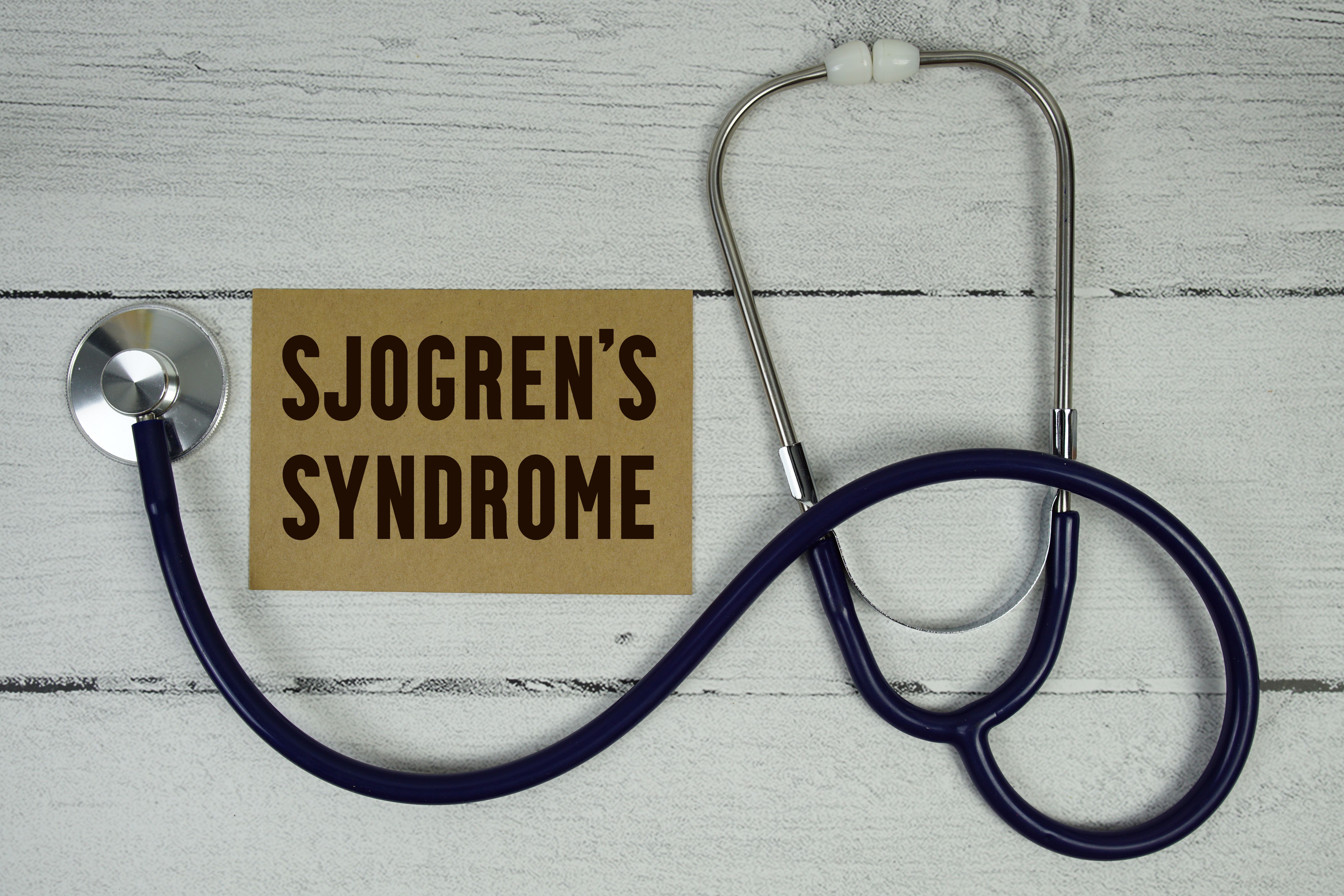 Sjogren's Syndrome text with Medical Stethoscope on wooden background | Image credit may1985 - stock.adobe.com
