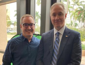 On the left, Scott Penberthy, PhD, MS, director, Applied AI, Office of the CTO, Google, and on the right,  with David Penberthy, MD, MBA, ACCC 2022-2023 president
