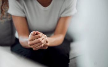 Hands psychology and mental health with a woman in a therapy session for grief counseling after loss Anxiety stress or depression with a female patient feeling nervous in a clinic for support-KApeopleimages-stock.adobe.com.jpeg