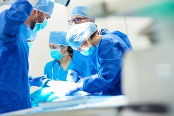 Doctors performing surgery | Image credit: gpointstudio - stock.adobe.com