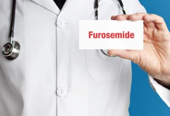 Doctor holding card that says furosemide | Image credit: MQ-Illustrations – stock.adobe.com