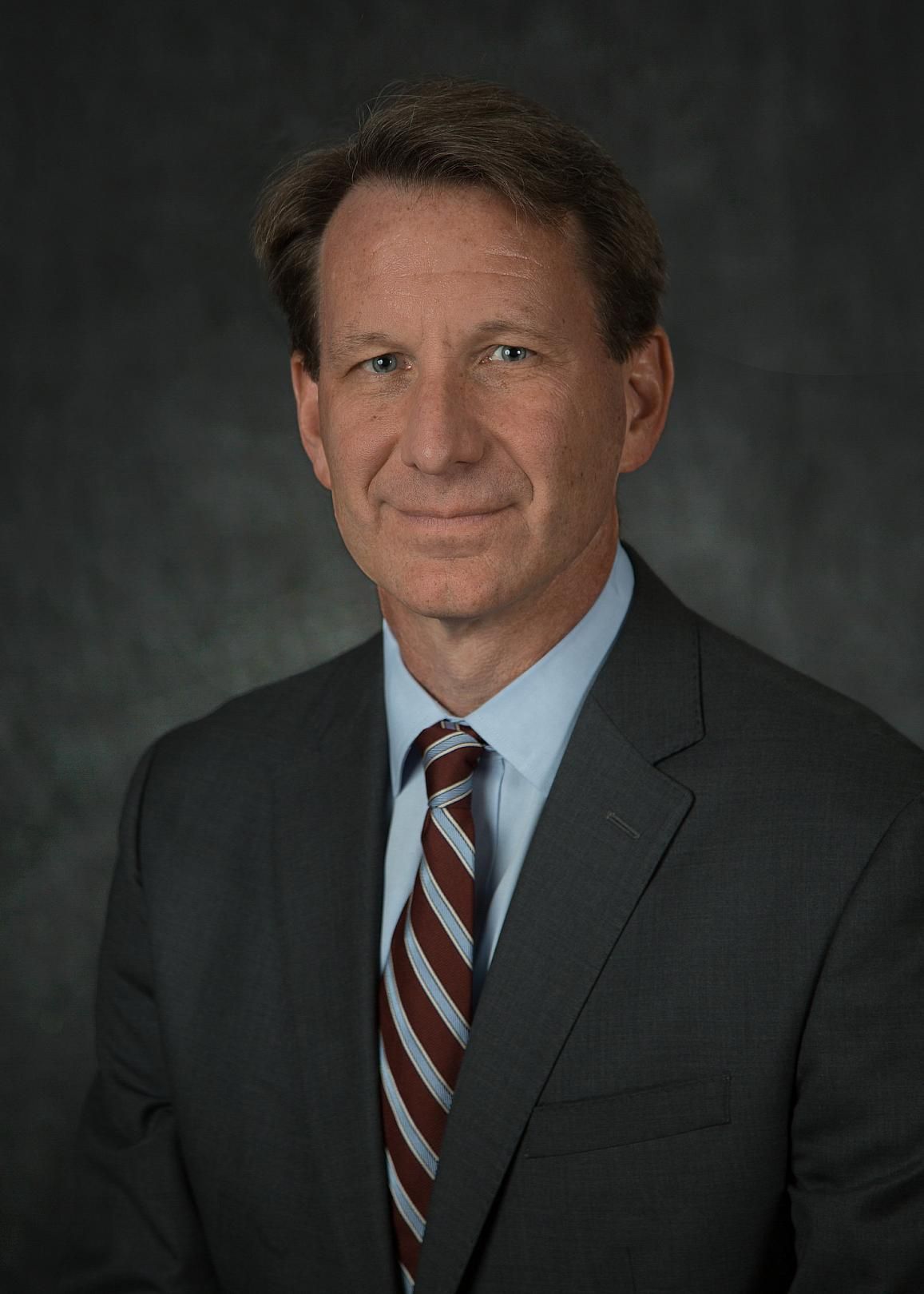 Sharpless Steps Down as NCI Director