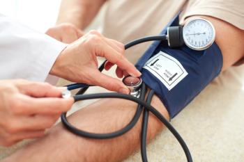 Clinician taking blood pressure measurement | Image Credit: grinny - stock.adobe.com