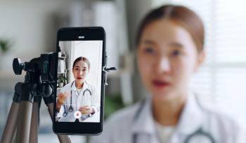 doctor and social media influencing | Image credit: Nattakorn - stock.adobe.com