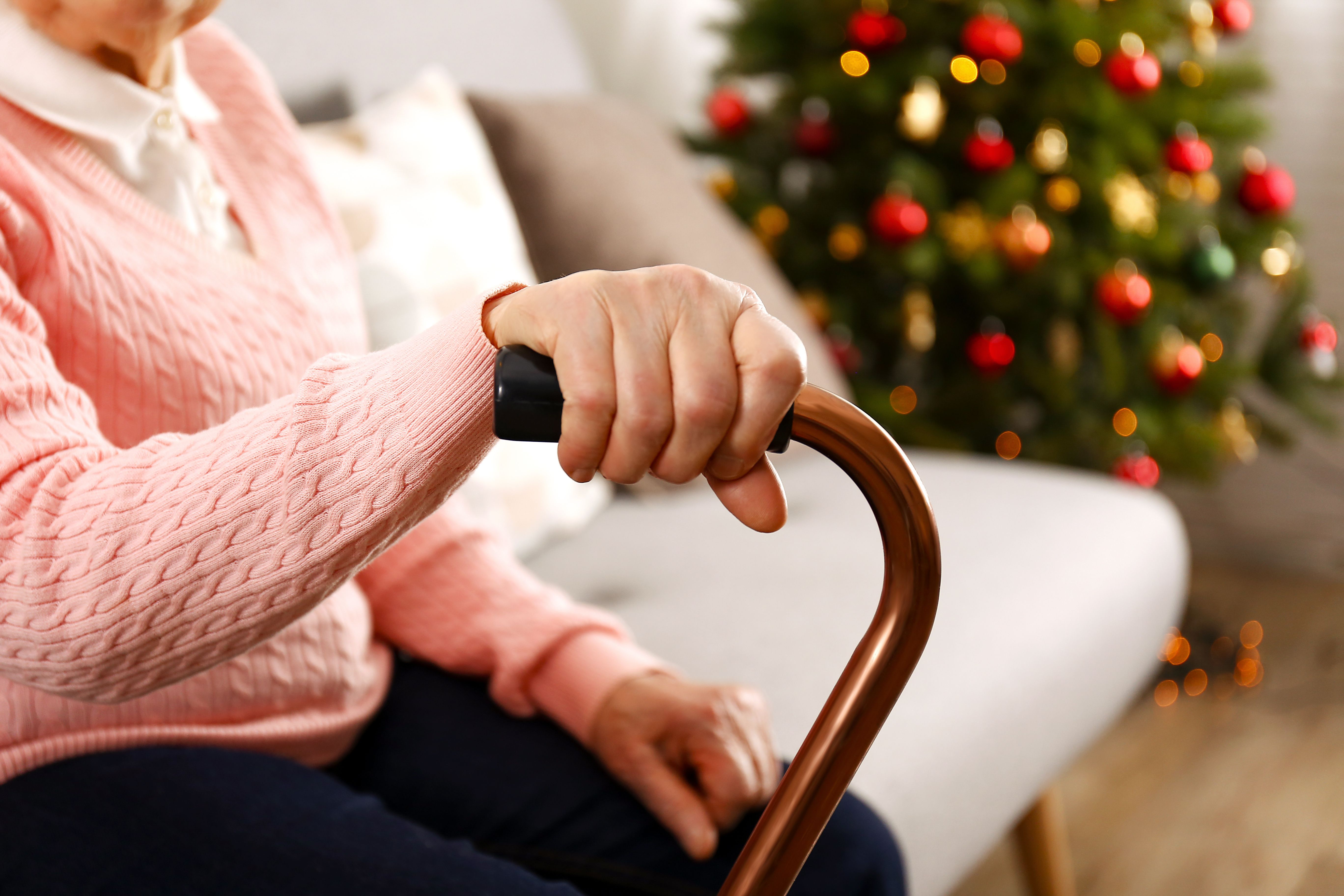 Older woman with cane