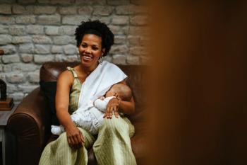 Woman breastfeeding | Image credit: bernardbodo – stock.adobe.com