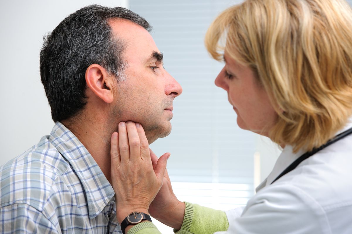 Physician examining patient.