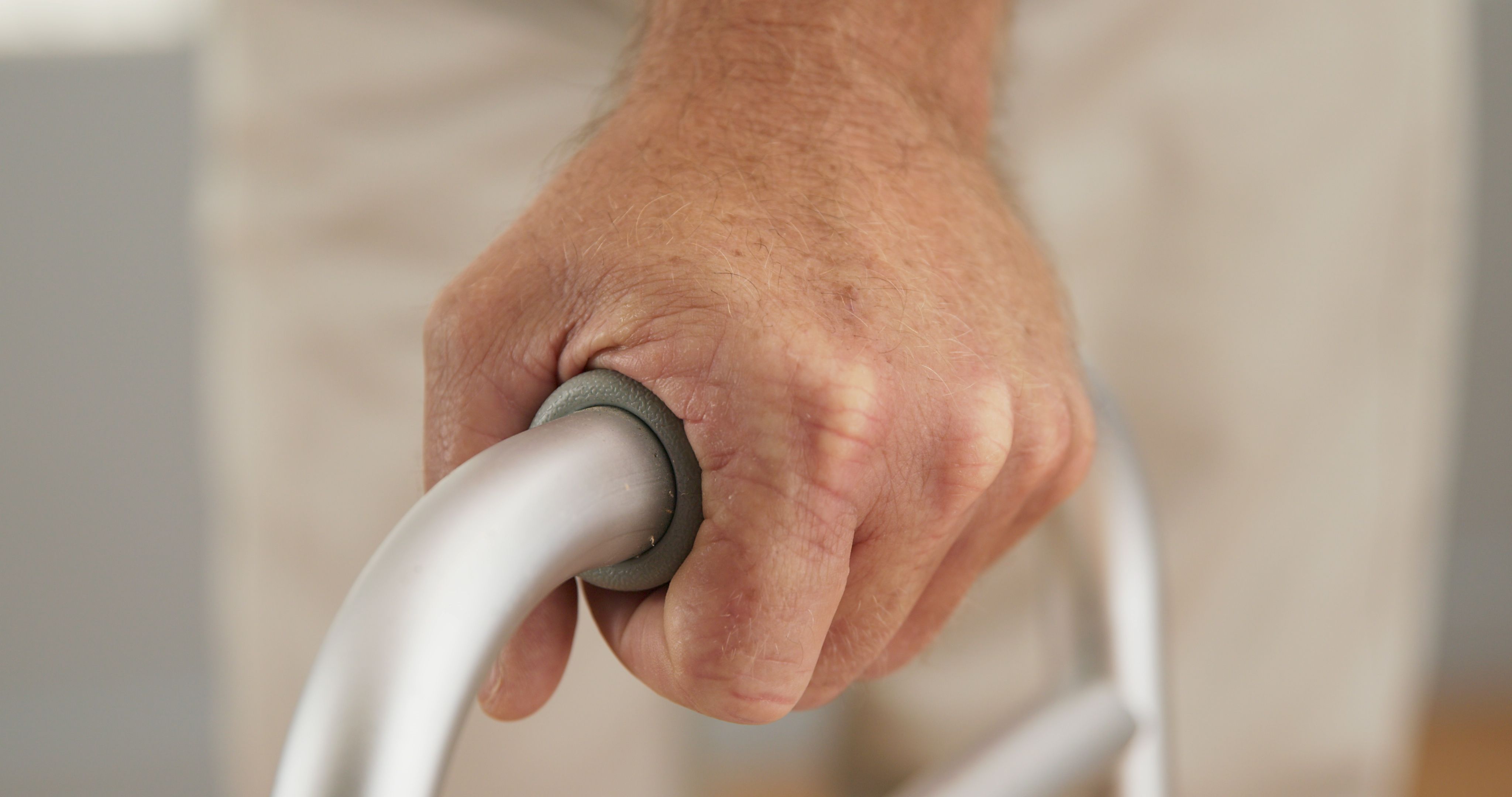 Hand gripping walker | Image credit: Mark Adams - stock.adobe.com