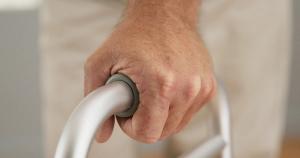 Hand gripping walker | Image credit: Mark Adams - stock.adobe.com