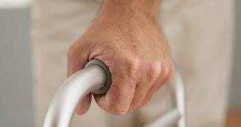 Hand gripping walker | Image credit: Mark Adams - stock.adobe.com