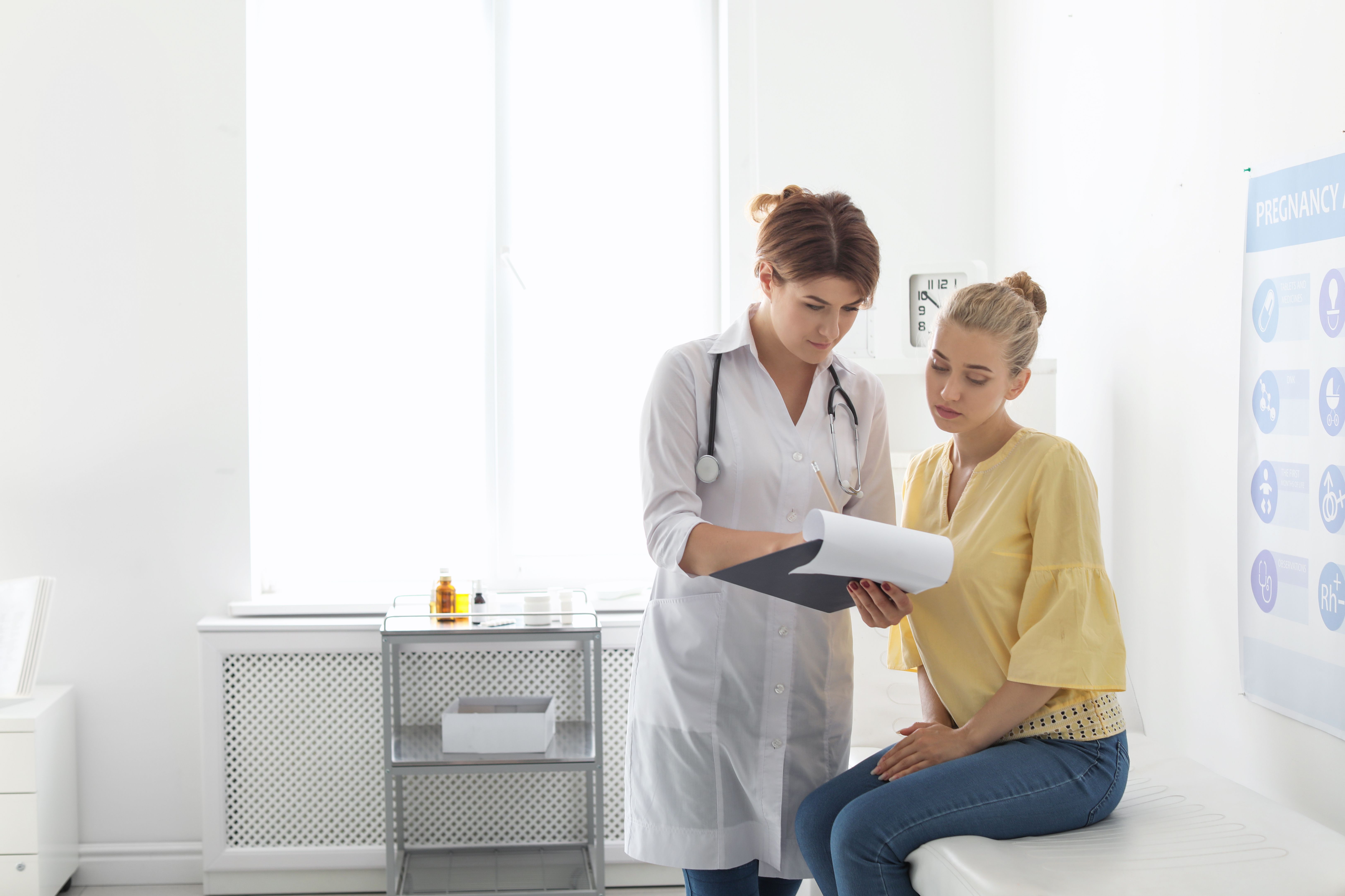 doctor speaking with patient