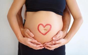 Pregnant stomach. | Image Credit:  Lianne du Toit/peopleimages.com -  stock.adobe.com