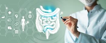 Unrecognizable female doctor holding graphic virtual visualization model of Intestine organ in hands | Image credit: mi_viri - stock.adobe.com