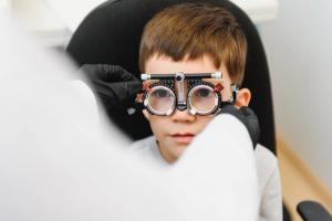 Boy at eye doctor | Image credit: Serhii - stock.adobe.com