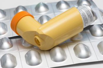 yellow inhaler placed on top of a pill sheet