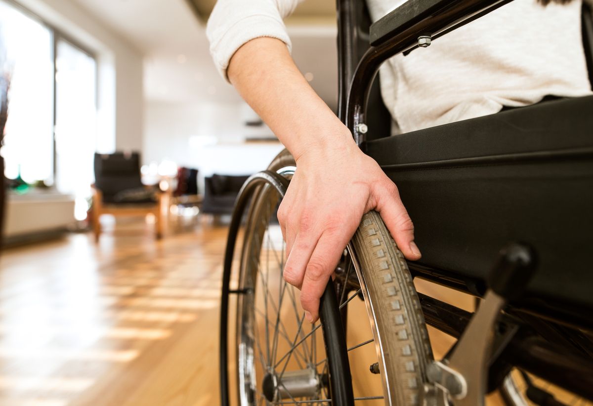 Young woman using wheelchair