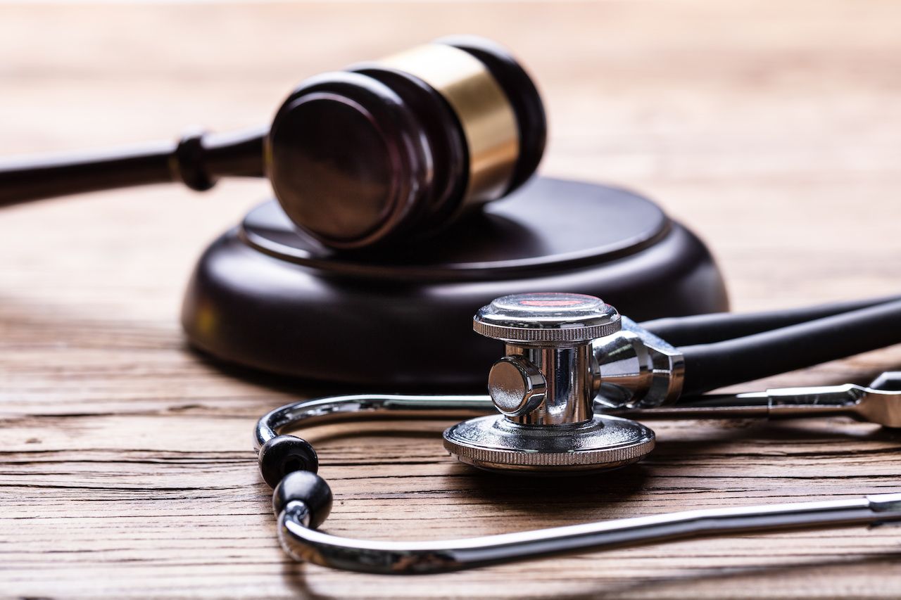 stethoscope and gavel | Image credit: Andrey Popov - stock.adobe.com