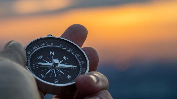 compass in hand with sunset sky on the background | Image credit: © Pyroll - © Pyroll - stock.adobe.com