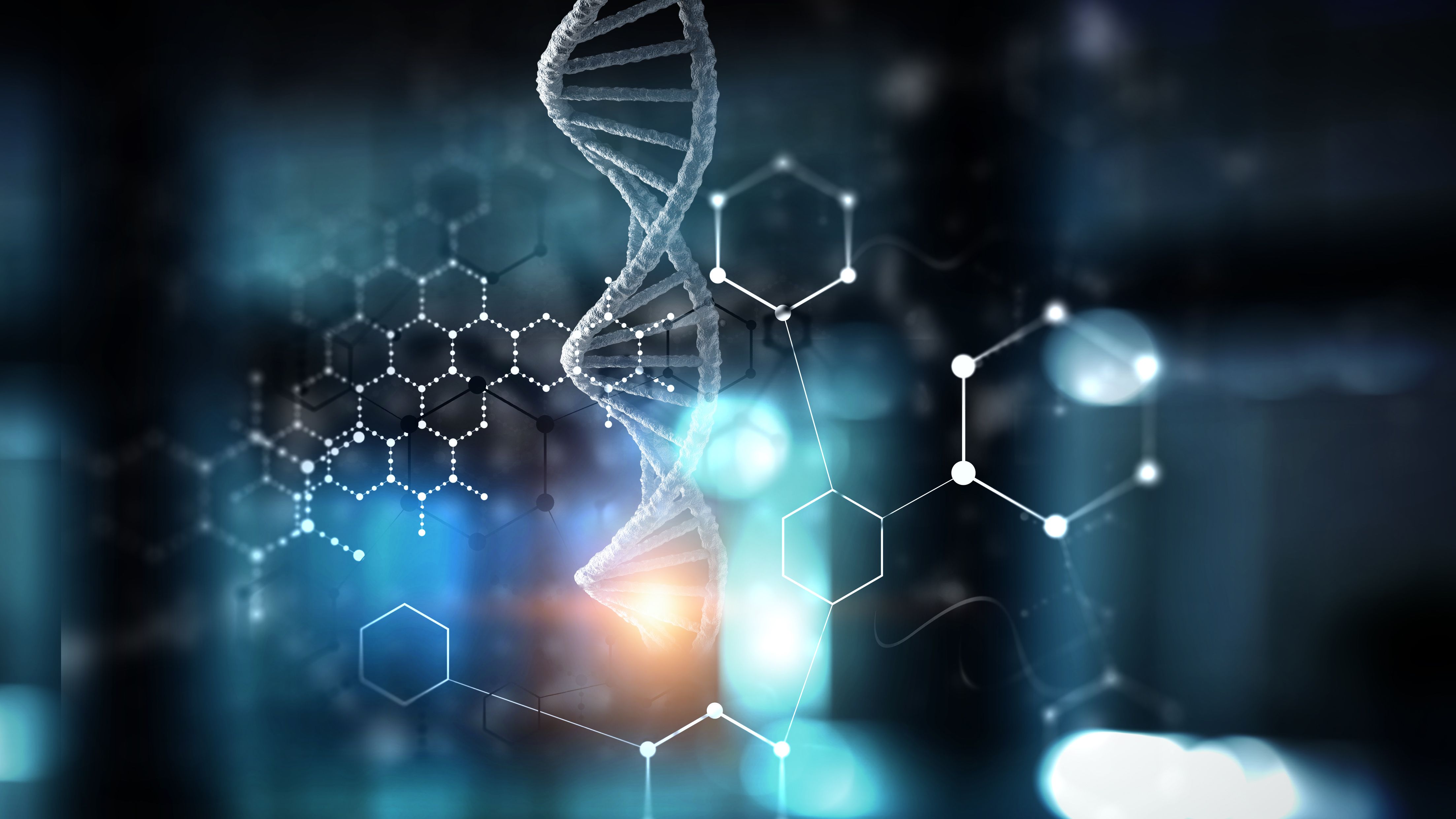 Digital rendering of interconnected DNA strands and molecular structures illuminated against a futuristic background, representing advances in biologics, immunotherapy, gene-based medicines, and next-generation drug development. | Image Credit: © Sergey Nivens - stock.adobe.com