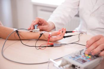 Healthcare professional performing electromyography testing to assess muscle and nerve activity in a patient with a neuromuscular disorder. | Image Credit: © romaset - stock.adobe.com