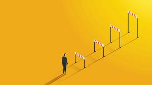 Businessman look at higher career barriers ambitious to overcome | Image Credit: © Lerbank-bbk22 - stock.adobe.com