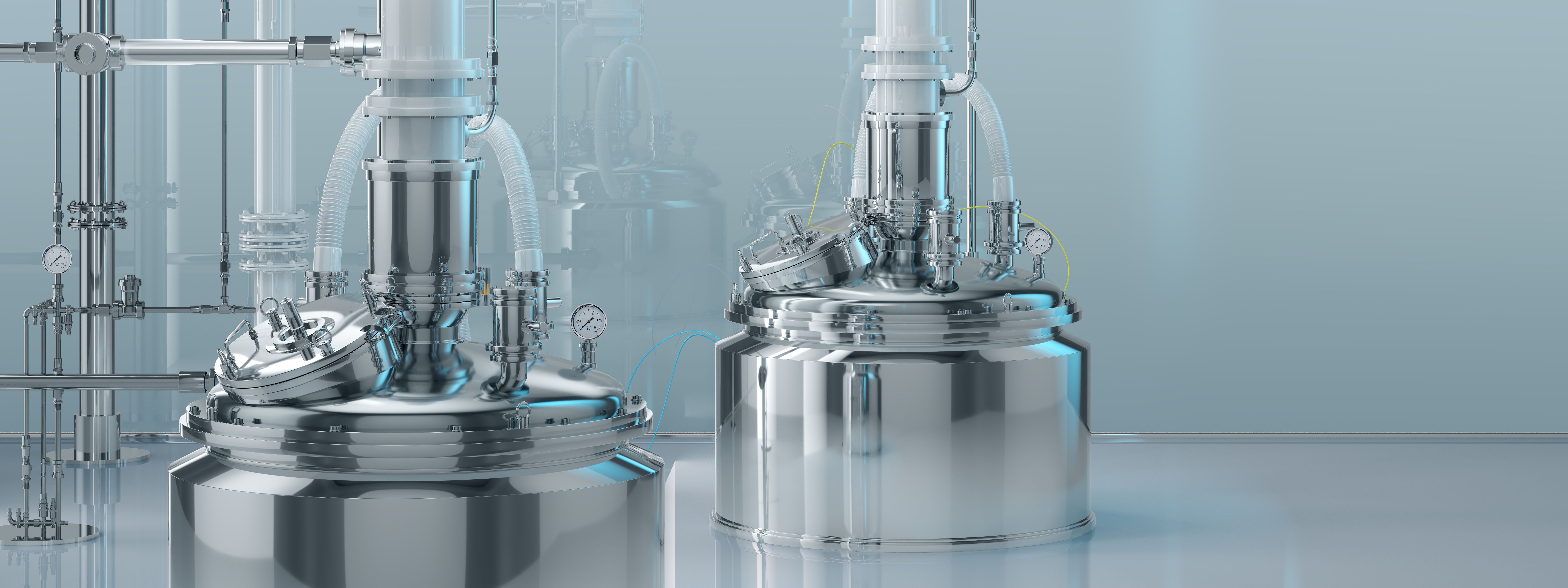 Stainless steel bioreactor vessels in a manufacturing facility. | Image Credit: © Corona Borealis - stock.adobe.com