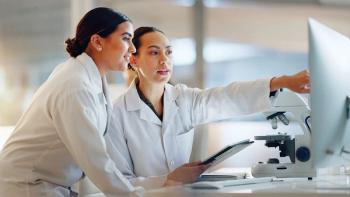 Scientist, women and teamwork on tablet and computer for laboratory advice, medical research and night planning. Students, science people or mentor on digital technology of test results or comparison | Image Credit: ©SneakyPeakPoints/peopleimages.com - Stock.adobe.com