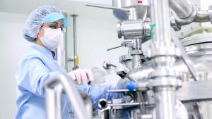 RGtimeline/Stock.Adobe.com – image shows pharmaceutical operator at a bioreactor