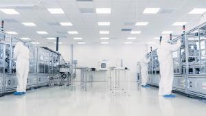 Team of Research Scientists in Sterile Suits Working with Computers, Microscopes and Modern Industrial Machinery in the Laboratory. Product Manufacturing Process: Pharmaceutics, Biotechnology.  | Image credit: © Gorodenkoff - © Gorodenkoff - stock.adobe.com