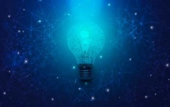 Abstract light bulb with circuit board lines inside over blue polygonal background | Image Credit" © Prostock-studio - stock.adobe.com