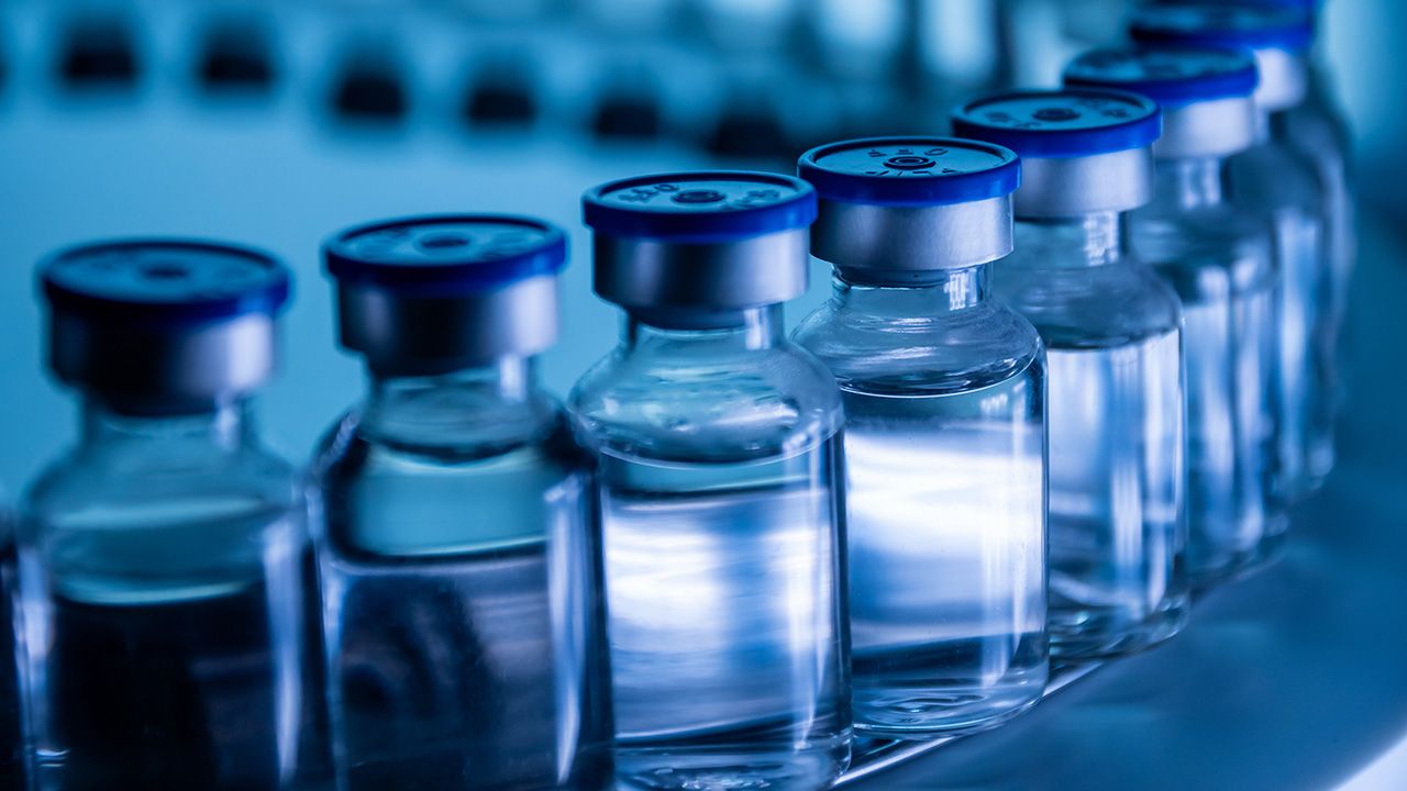 Group of Vaccine bottles. Medicine in ampoules. Glass vials for liquid samples in laboratory. | Image credit: © ronnarong - © ronnarong - stock.adobe.com