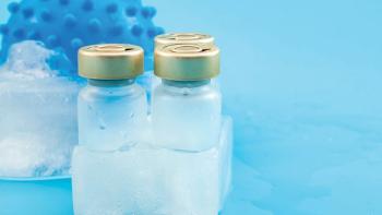 Low storage temperatures for pharmaceutical medicine, covid treatment and coronavirus vaccination concept with vaccine and virus frozen in a chunk of ice isolated on blue background with copy space | Image Credit: © Victor Moussa - © Victor Moussa - stock.adobe.com