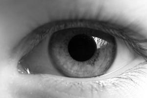 Human eye close-up in black and white. Extended pupil | Image Credit: © Annashou - stock.adobe.com