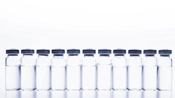 nikilitov/Stock.Adobe.com–illustrative of vials lined up for final product inspection before being packaged