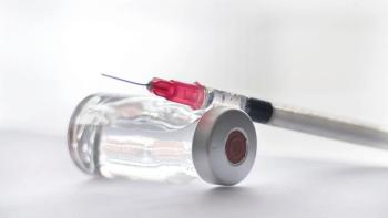  a vial containing clear fluid is shown with a syringe | Image Credit: ©Graham - stock.adobe.com