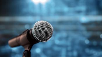 Public speaking backgrounds, Close-up the microphone on stand for speaker speech at seminar room with technology light background and blur bokeh. | Image credit: © Eakrin - © Eakrin - stock.adobe.com