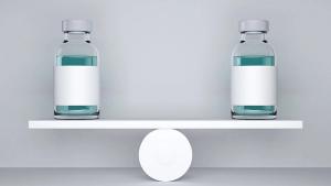 two vaccine mockup balance on a swing | Image Credit: ©petrovk – stock.adobe.com