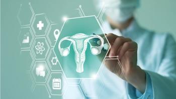 Unrecognizable female doctor holding graphic virtual visualization model of Uterus organ in hands. Multiple virtual medical icons. | Image credit: © mi_viri - © mi_viri - stock.adobe.com