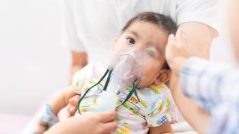 Asian little baby boy is is treated respiratory problem with vapor nebulizer and sister's hand is touching his head to make him feel better, concept of pediatric patient care for sick in the hospital. | Image credit: © Sukjai Photo - © Sukjai Photo - stock.adobe.com
