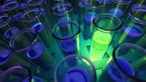 3D rendered laboratory test tubes with fluorescent green positive results in uv light | Image Credit: ©mguido - stock.adobe.com