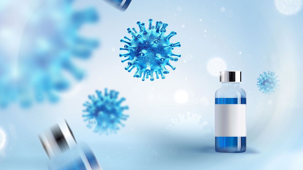 coronavirus COVID-19 under the microscope. 3d illustration. Concept illustration of a coronavirus vaccine. A medicine bottle and flying viruses. Vaccine complete development. end of novel corona virus | Image Credit: © FILANT - © FILANT - stock. adobe.com 